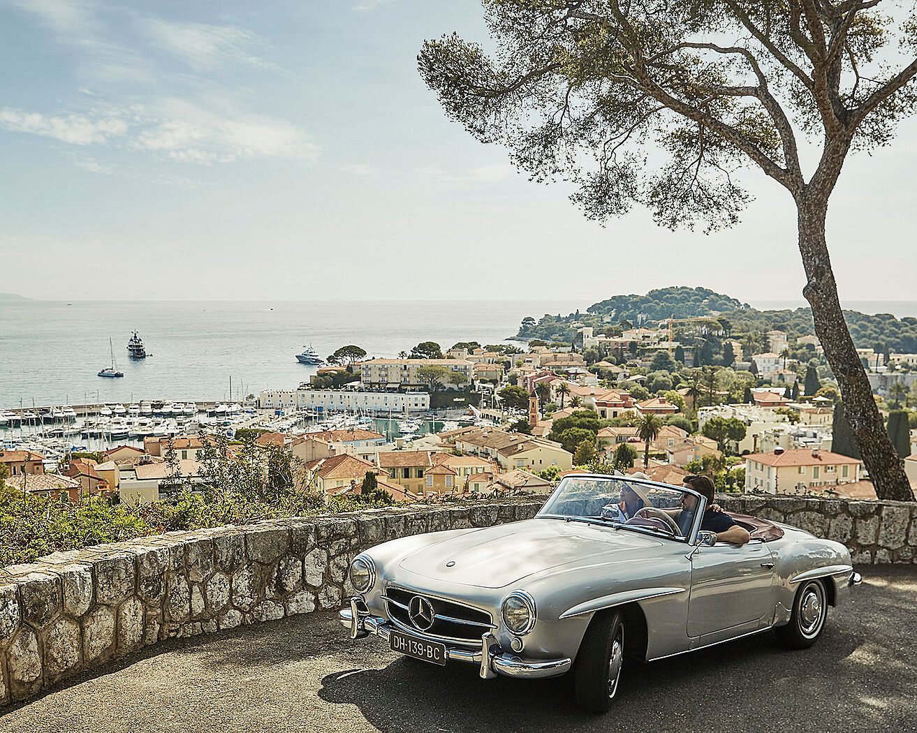 A vintage convertible overlooking the harbor at Cap-Ferrat